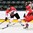 GRAND FORKS, NORTH DAKOTA - APRIL 15: Canada's Michael McLeod #22 looks to let a shot go while Denmark's Oliver Larsen #5 defends during preliminary round action at the 2016 IIHF Ice Hockey U18 World Championship. (Photo by Minas Panagiotakis/HHOF-IIHF Images)

